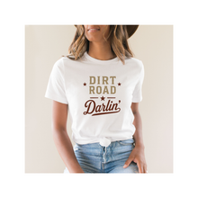 Load image into Gallery viewer, Person wearing a white t-shirt with 'Dirt Road Darlin' text and stars.